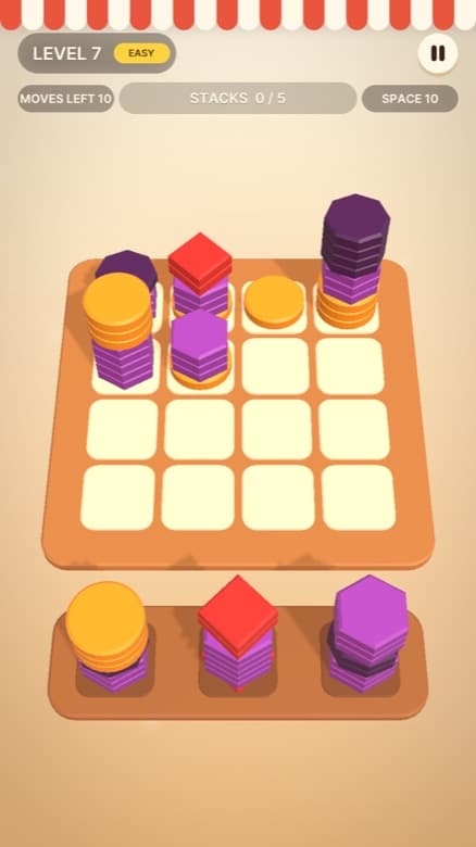 Un tablero de Sunny Sort a media partida, con pilas de monedas y hexágonos sobre una rejilla de madera